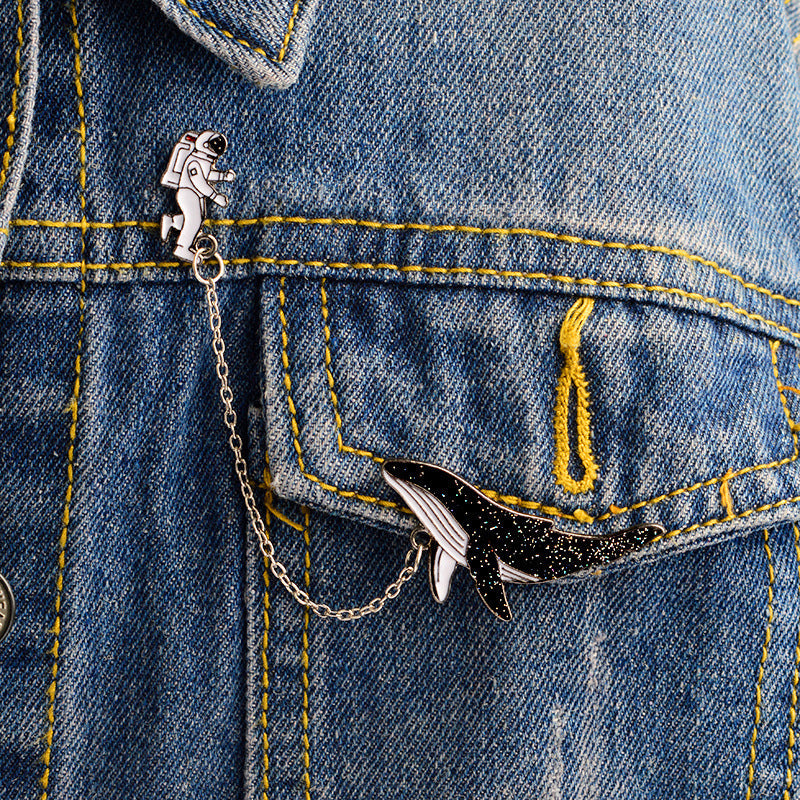 Pin with a chain - whale and astronaut