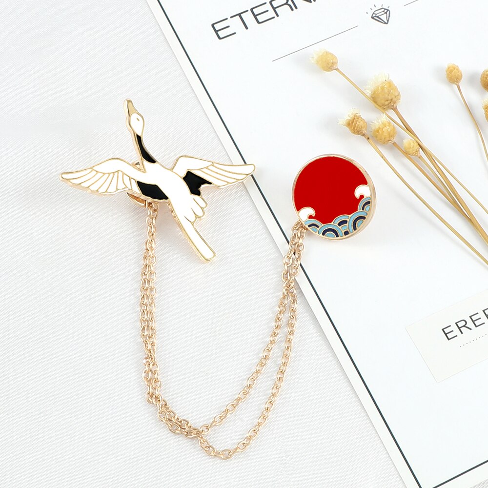 Bird-motif brooch