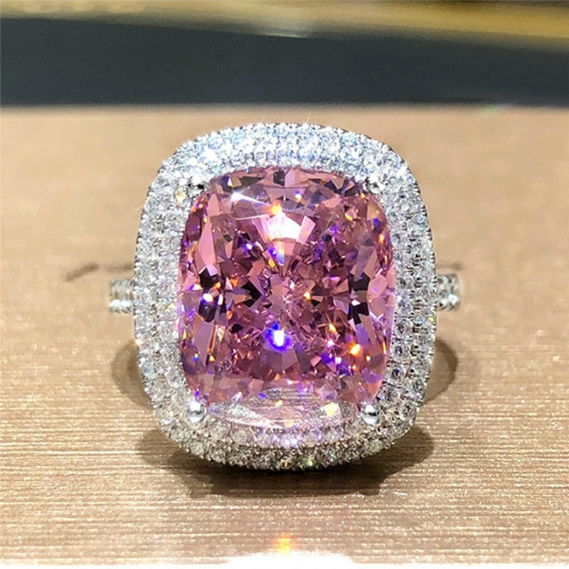 Ring with zircons and a stone
