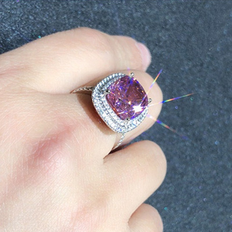 Ring with zircons and a stone