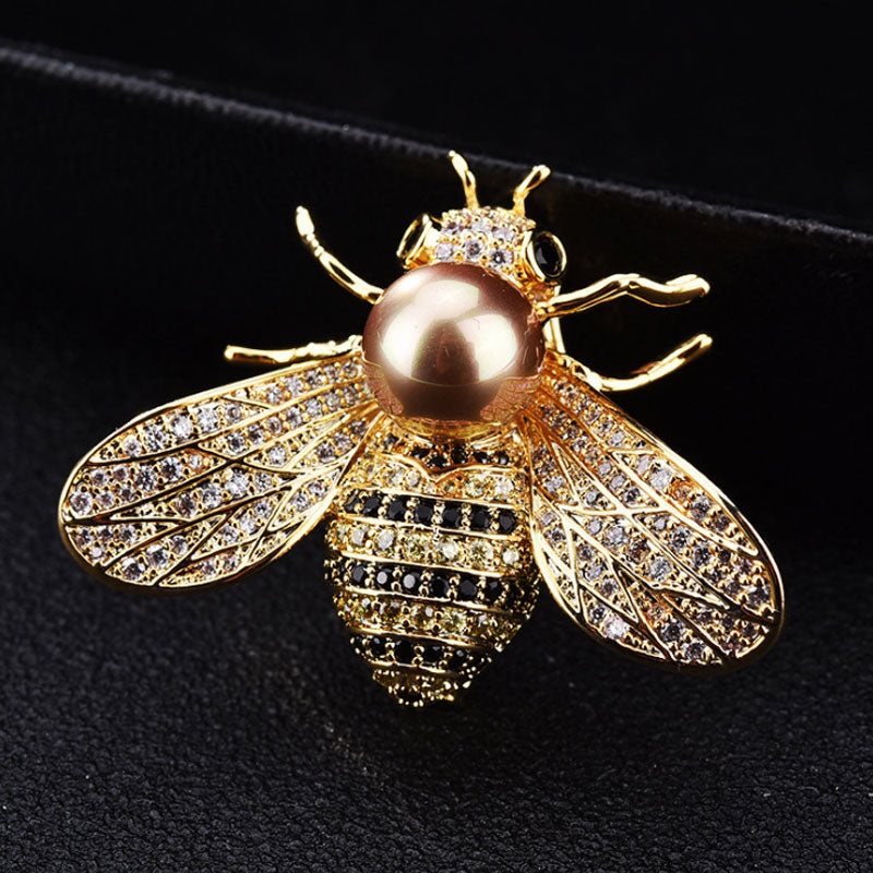 Brooch with a pearl imitation - bee
