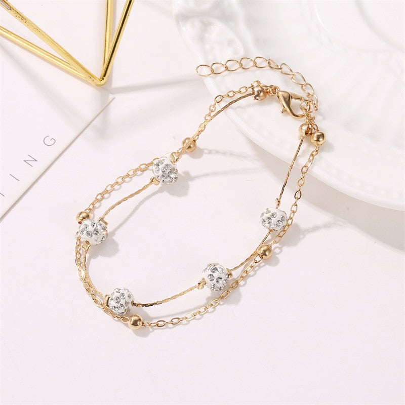 Double ankle bracelet with accessories