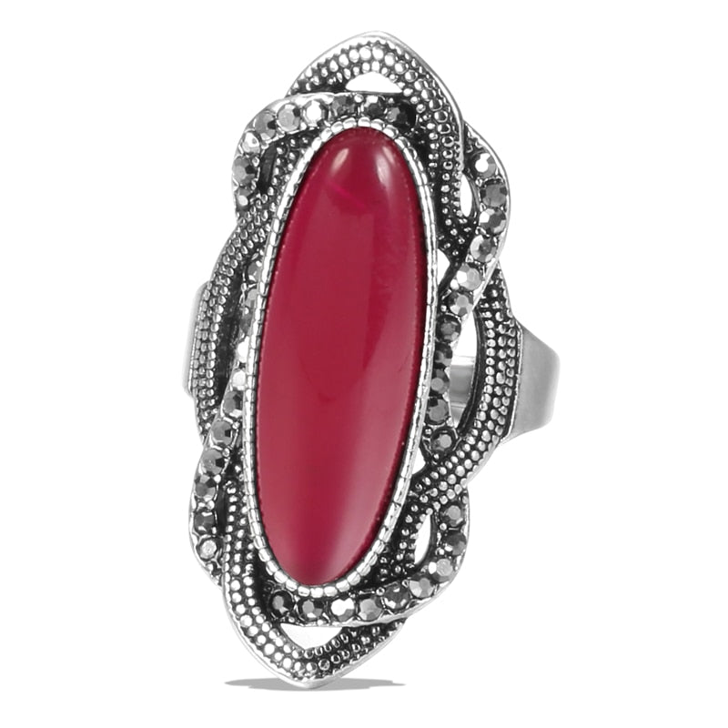 Ring with a longitudinal eyelet