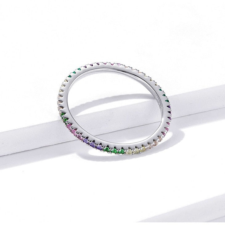 Ring with colorful zircons