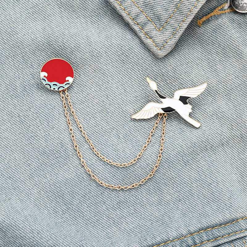 Pin with a chain - bird