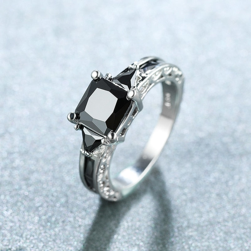 Ring with black zircons