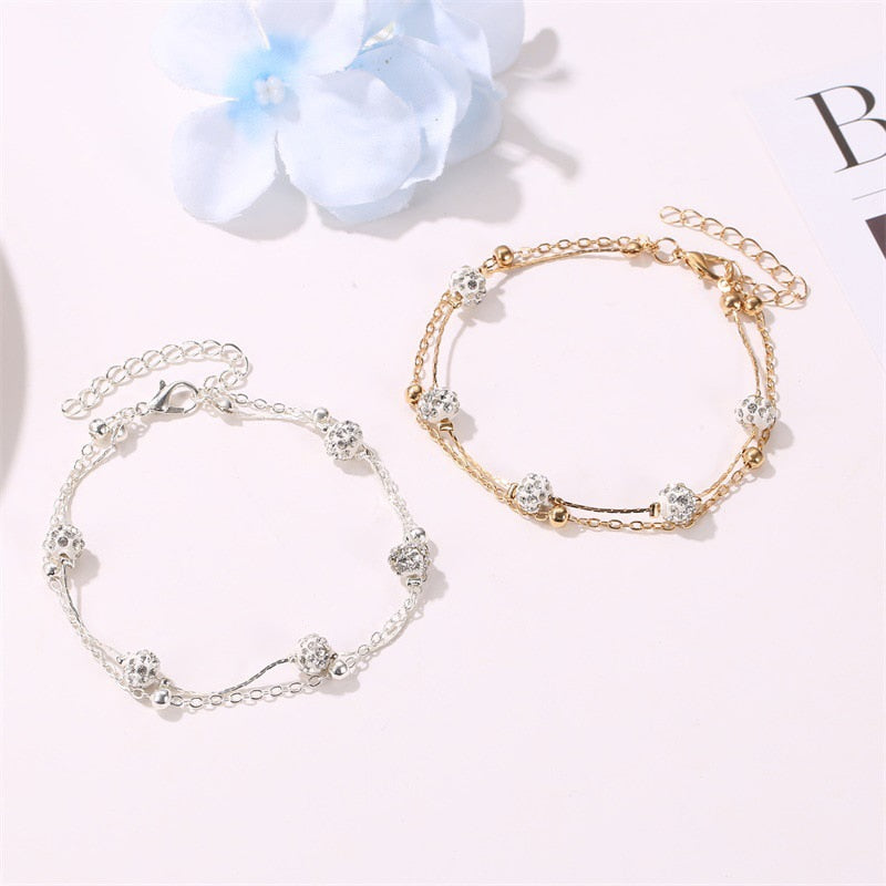 Double ankle bracelet with accessories