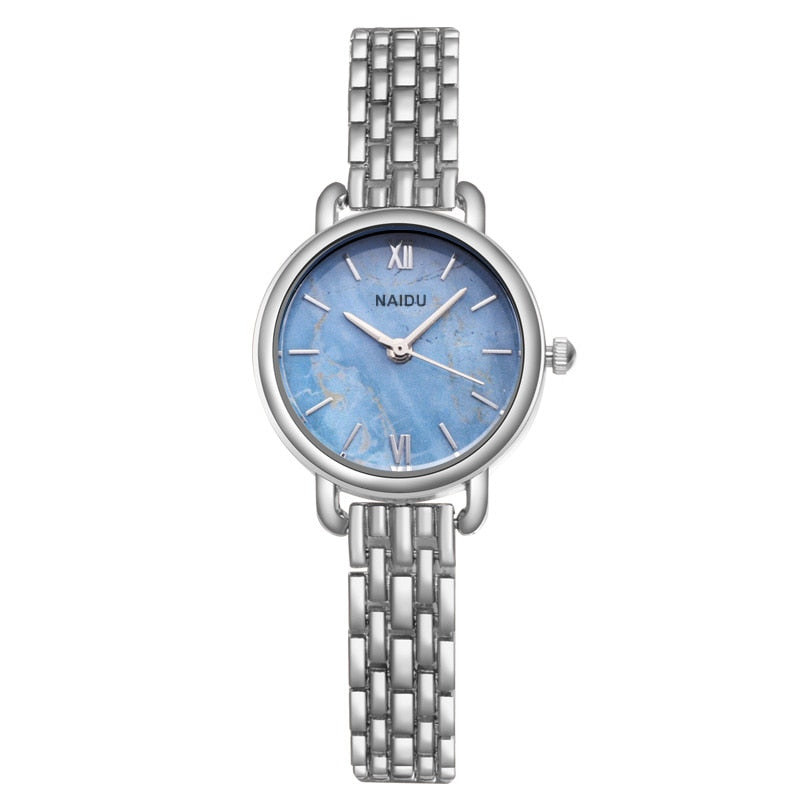 Elegant ladies watch on a bracelet with a stone motif.