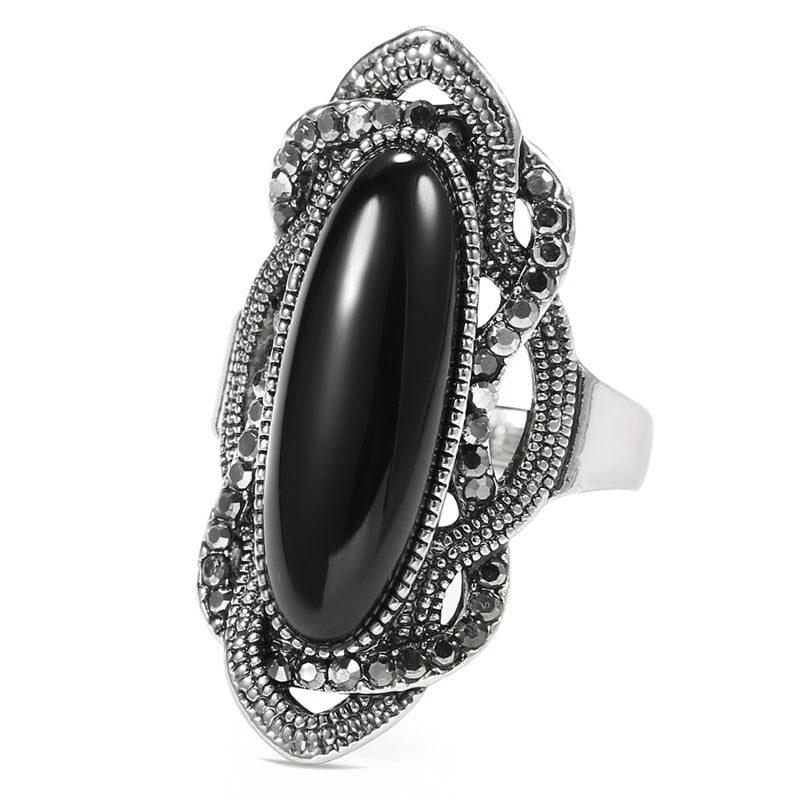 Ring with a longitudinal eyelet