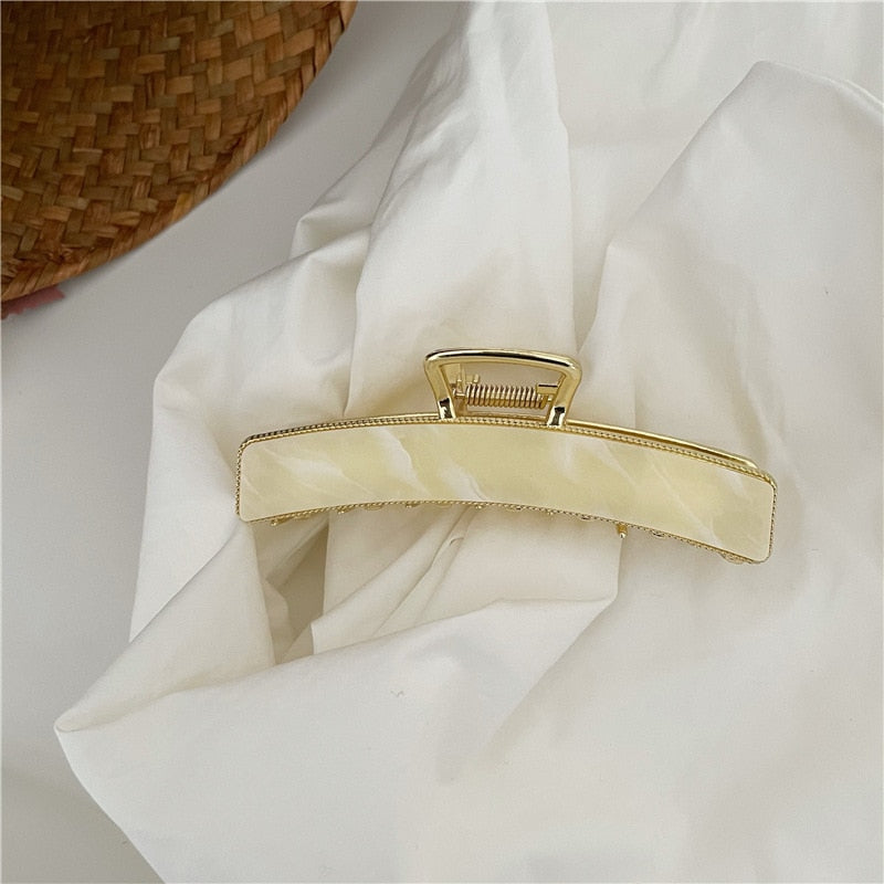 Acrylic hair clip with a marble pattern