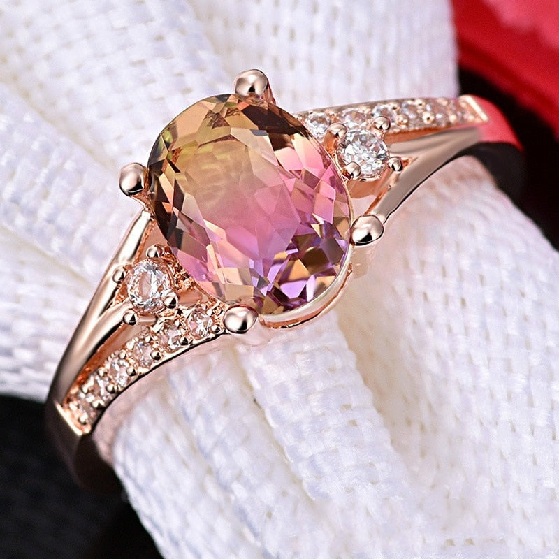 Ring with zircons and a stone