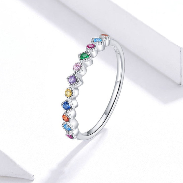 Ring with colorful zircons