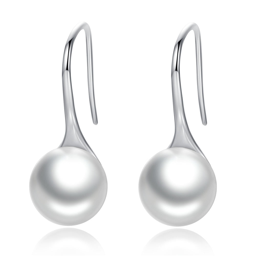 Hanging pearl earrings