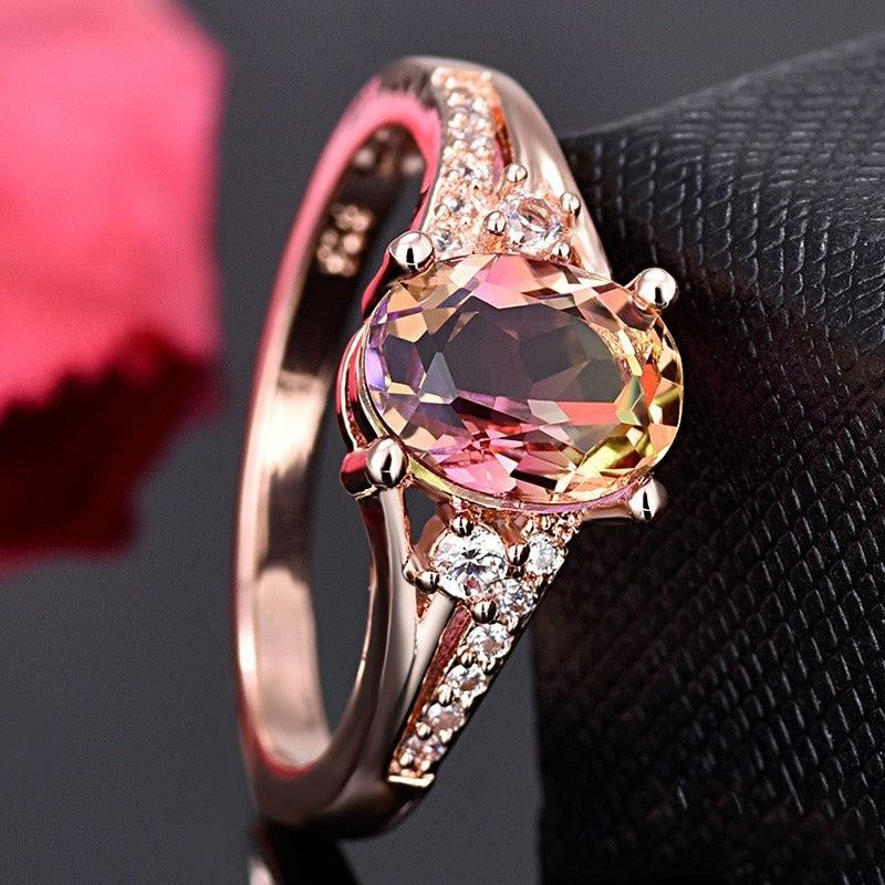 Ring with zircons and a stone
