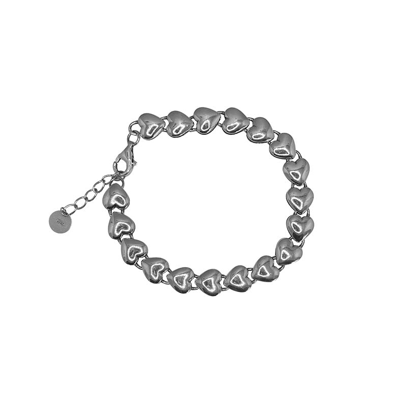 Silver heart motif bracelet