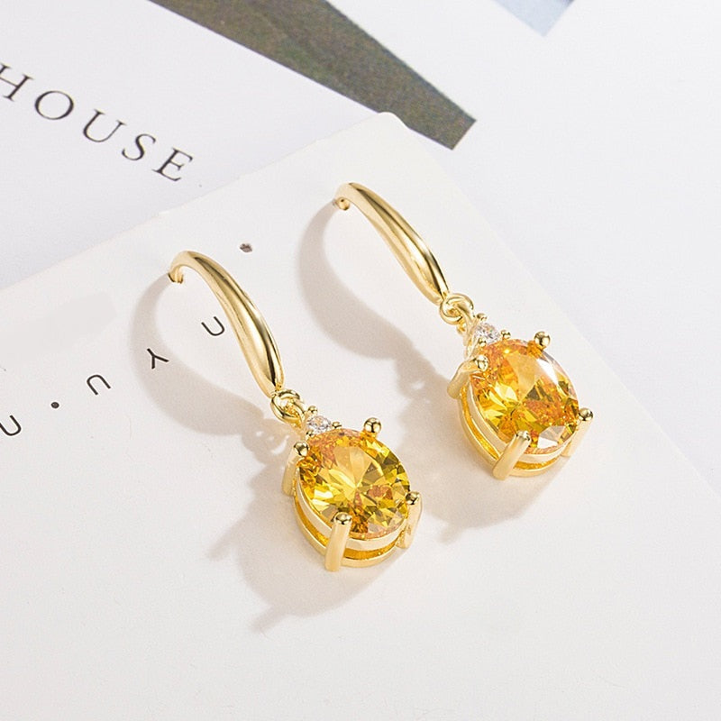 Gold earrings with zirconia