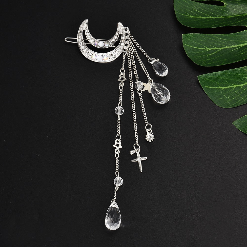 Moon-shaped hair clip with hanging beads