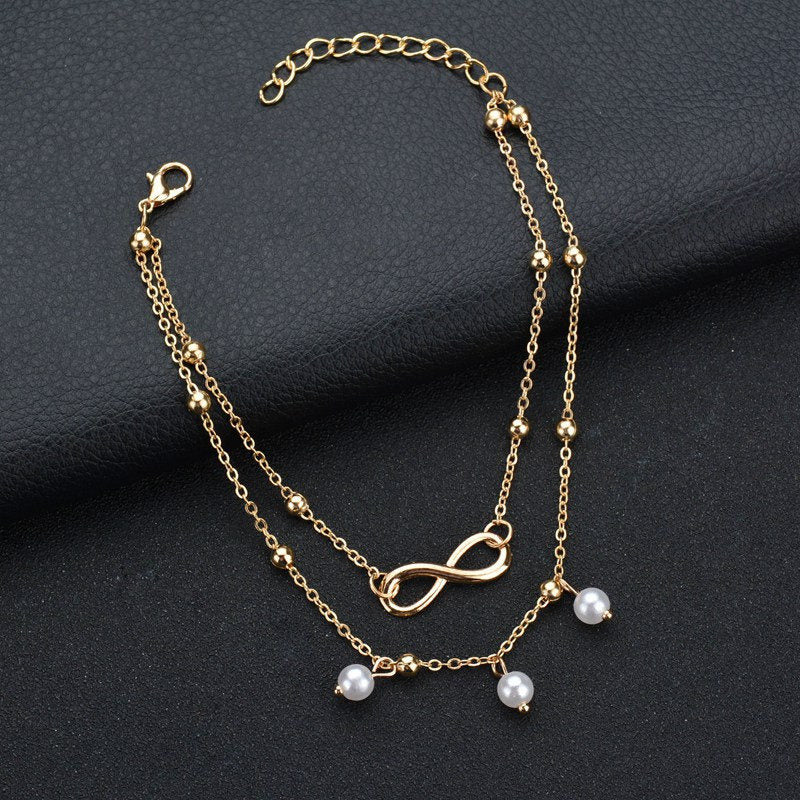Double ankle bracelet with pendants