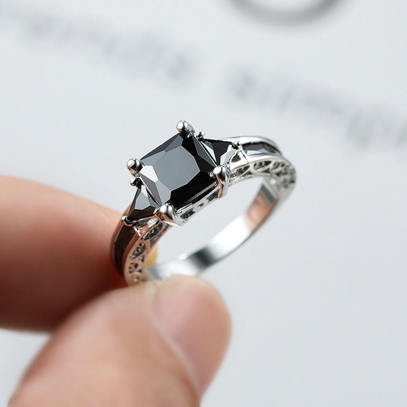 Ring with black zircons