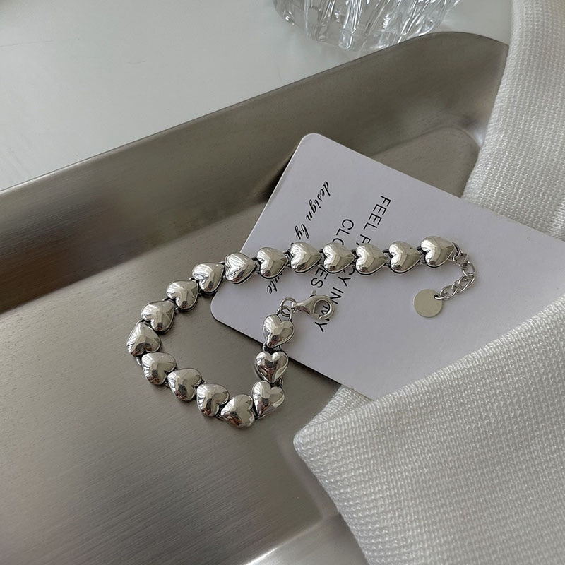 Silver heart motif bracelet