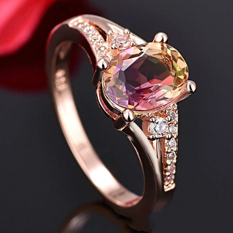 Ring with zircons and a stone