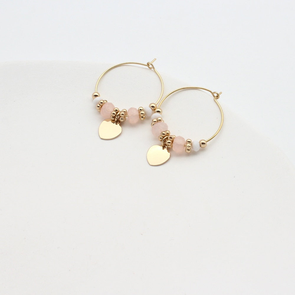 Hanging earrings with pendants