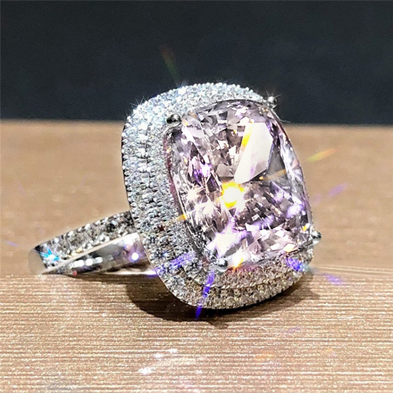 Ring with zircons and a stone