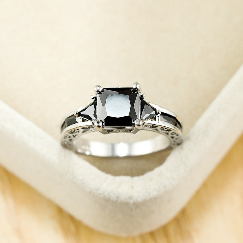 Ring with black zircons