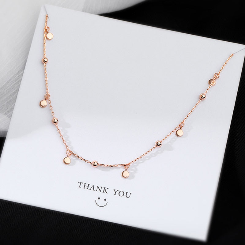 Necklace with small pendants