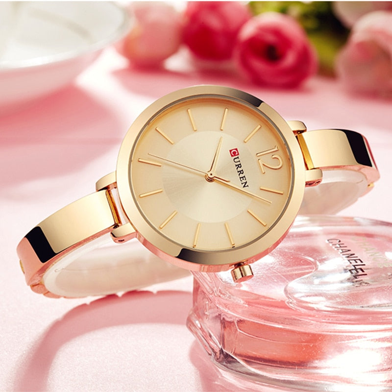 Ladies watch on a delicate decorative bracelet