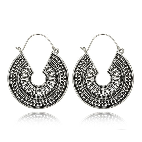 Earrings with Aztec motif