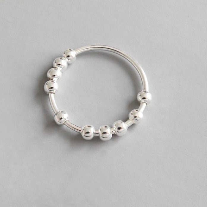 Ring with beads