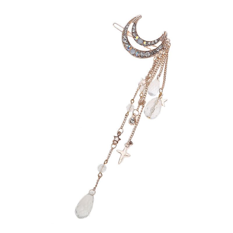 Moon-shaped hair clip with hanging beads