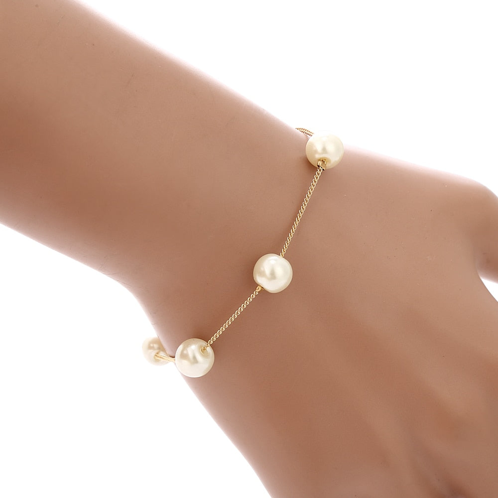 Set with imitation pearls