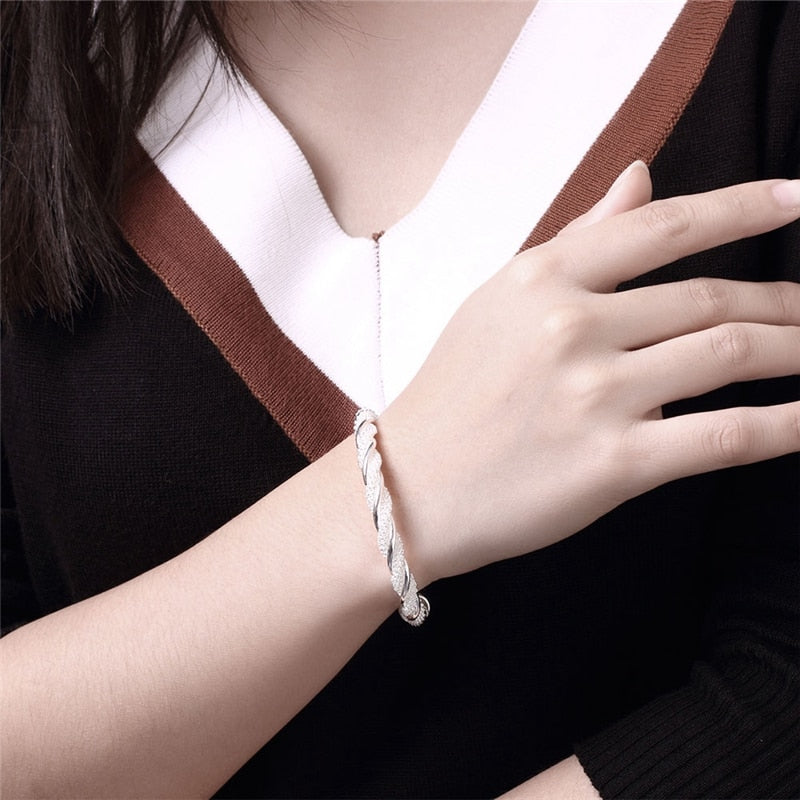 Silver bracelet with a weave