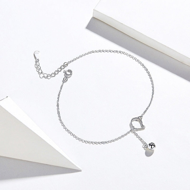 Silver ankle bracelet with a cat motif