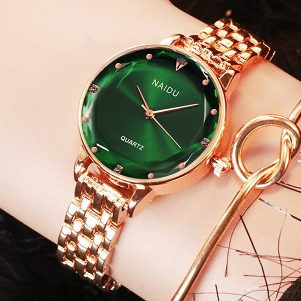 Elegant ladies watch on a bracelet with a colorful dial