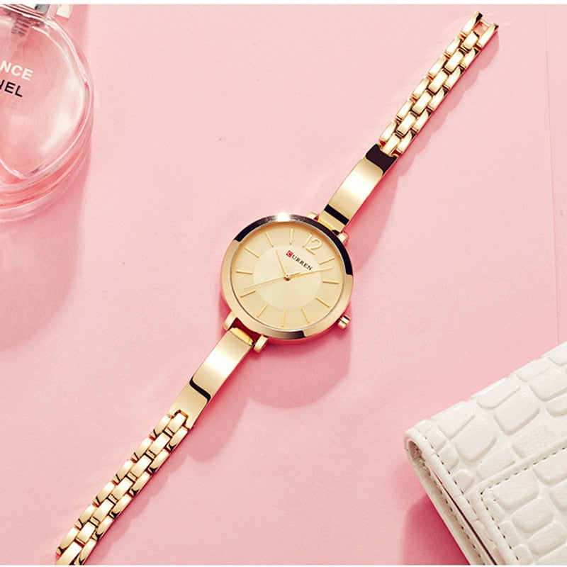 Ladies watch on a delicate decorative bracelet