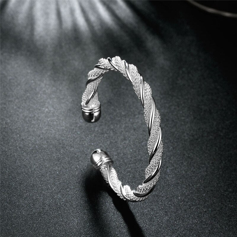 Silver bracelet with a weave