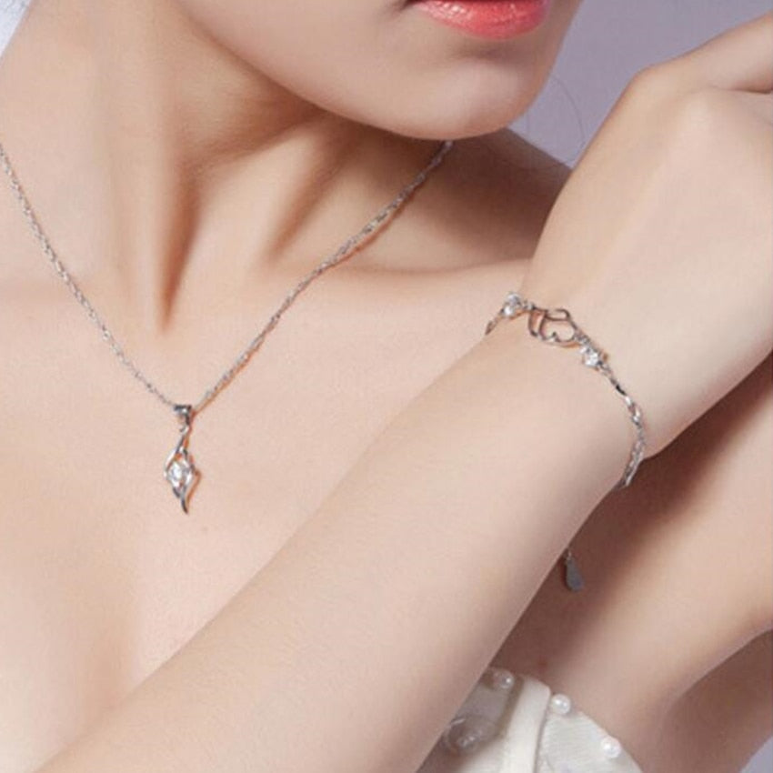 Silver heart motif bracelet