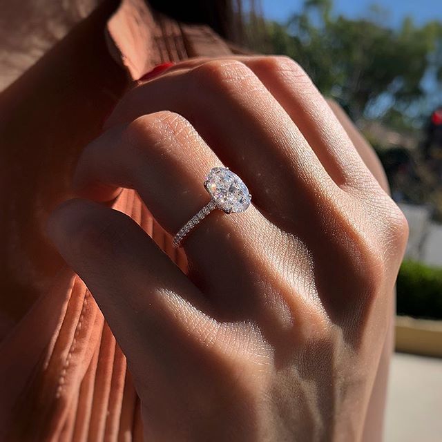 Ring with zircons and a large eyelet