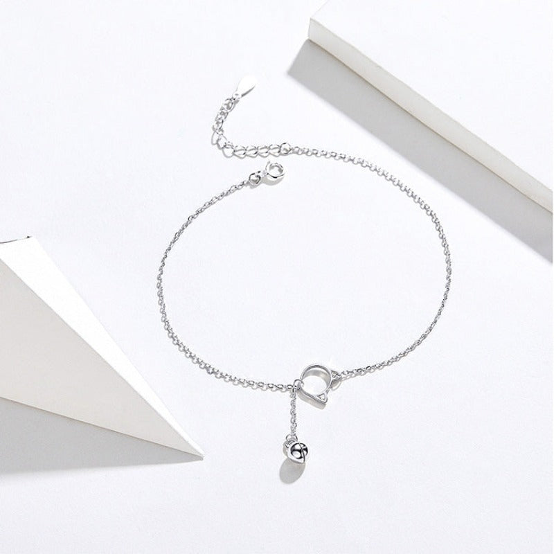 Silver ankle bracelet with a cat motif