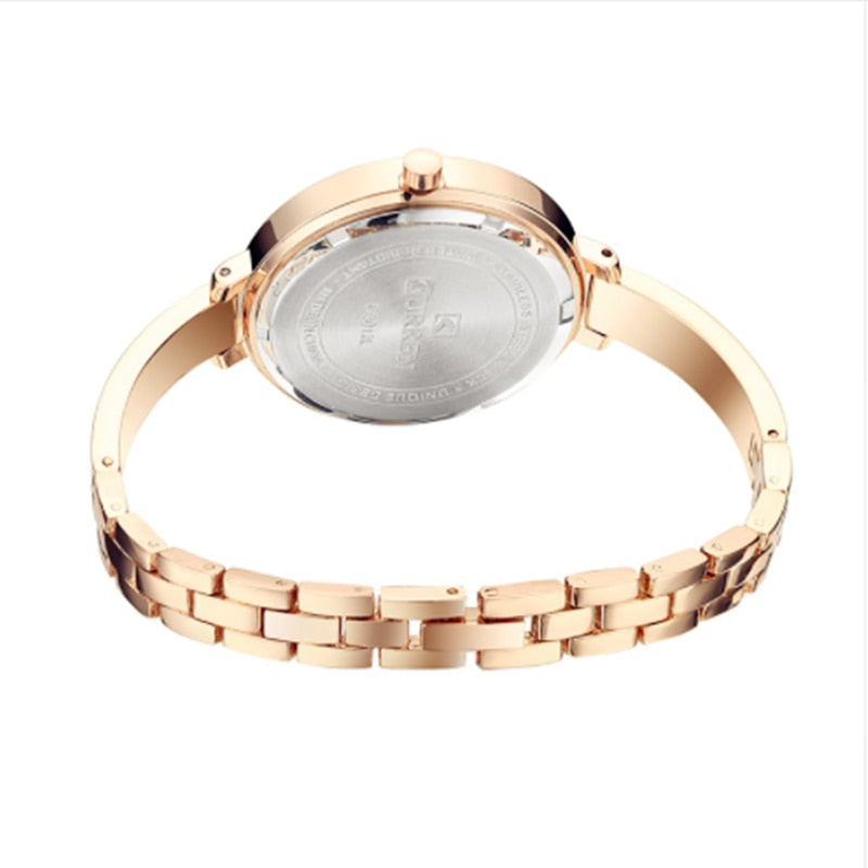 Ladies watch on a delicate decorative bracelet