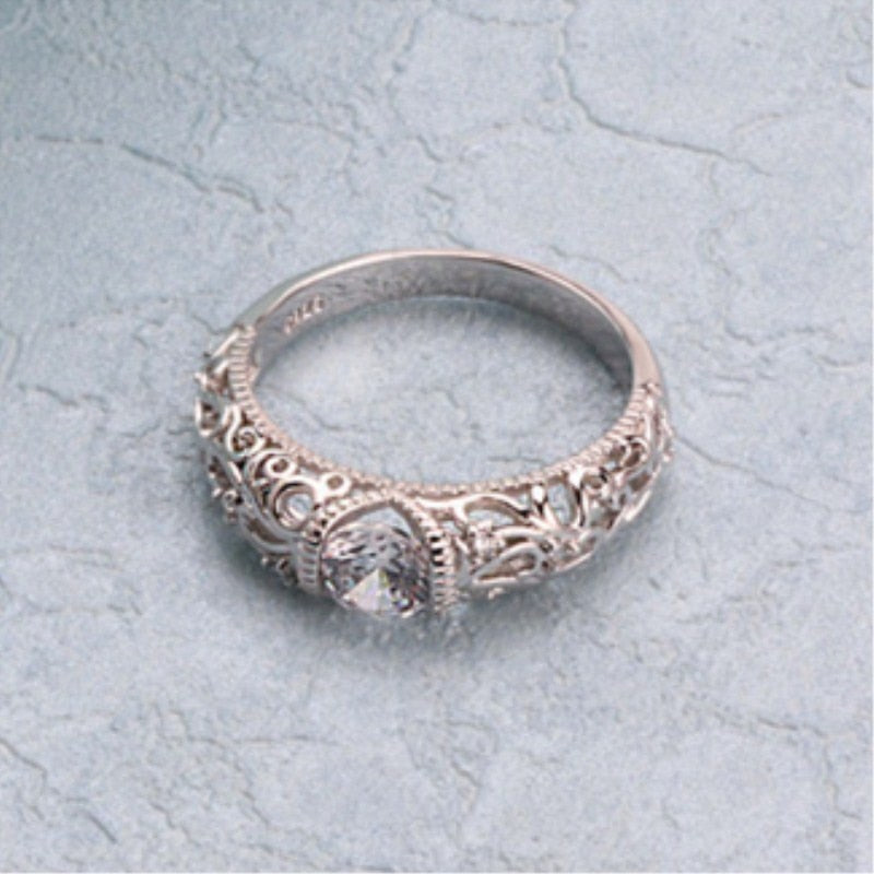 Openwork ring with cubic zirconia