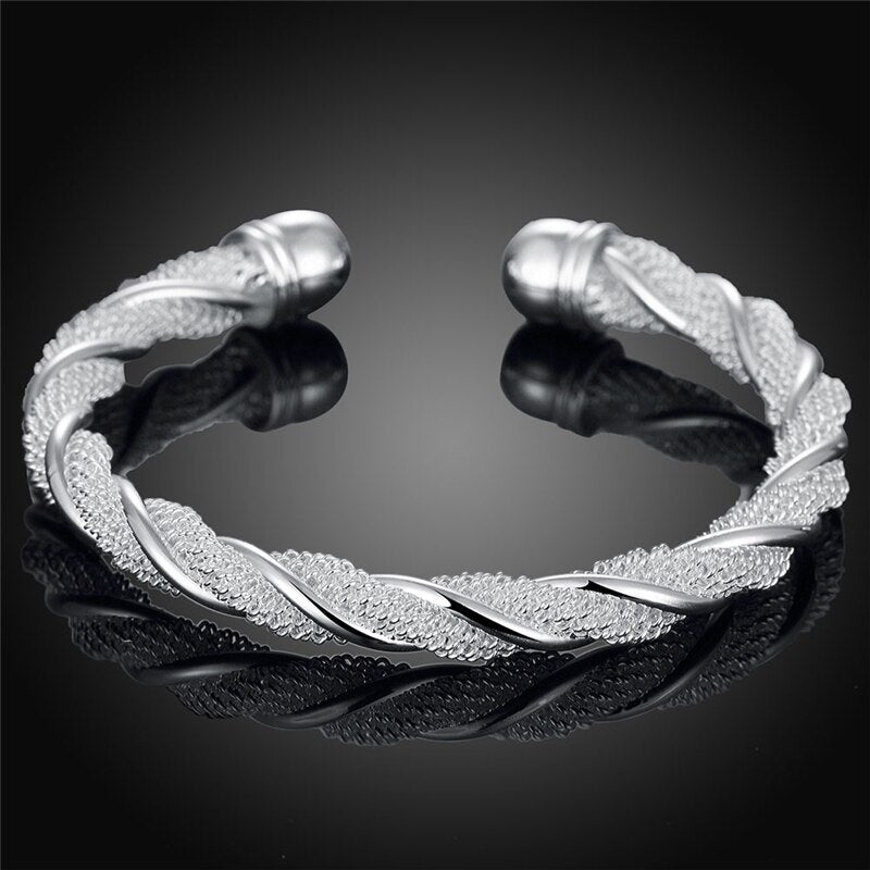 Silver bracelet with a weave