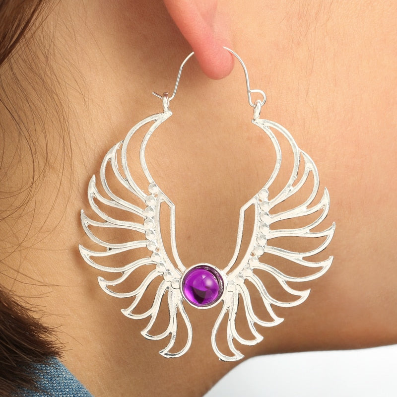 Wing motif earrings