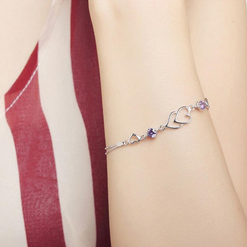 Silver heart motif bracelet