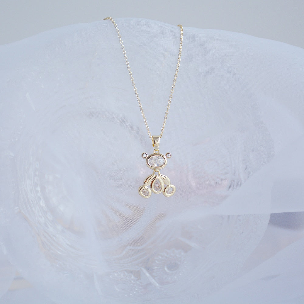 Necklace with a teddy bear pendant