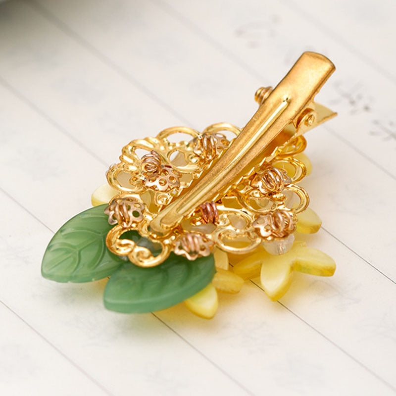 Hair clips with yellow flowers