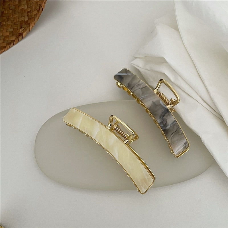 Acrylic hair clip with a marble pattern